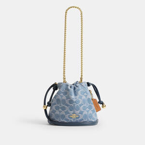 Coach Outlet Faye Mini Drawstring Bag In Signature Denim